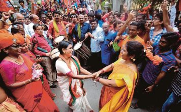 Bharatiya Janata Party (BJP) supporters celebrate the BJP's potential win as votes are counted for the Lok Sabha election in Bangalore, India, 23 May 2019. The Lok Sabha, the lower house of Parliament, elections, which began on 11 April 2019, is having the results tallied on 23 May. The Lok Sabha elections were held for 542 of the 543 lower house seats, and a party or alliance needs 272 seats to form a government. According to initial polling Narendra Modi could retain the position of Prime Minister along with the Bhartya Janta Party (BJP). EPA/JAGADEESH NV